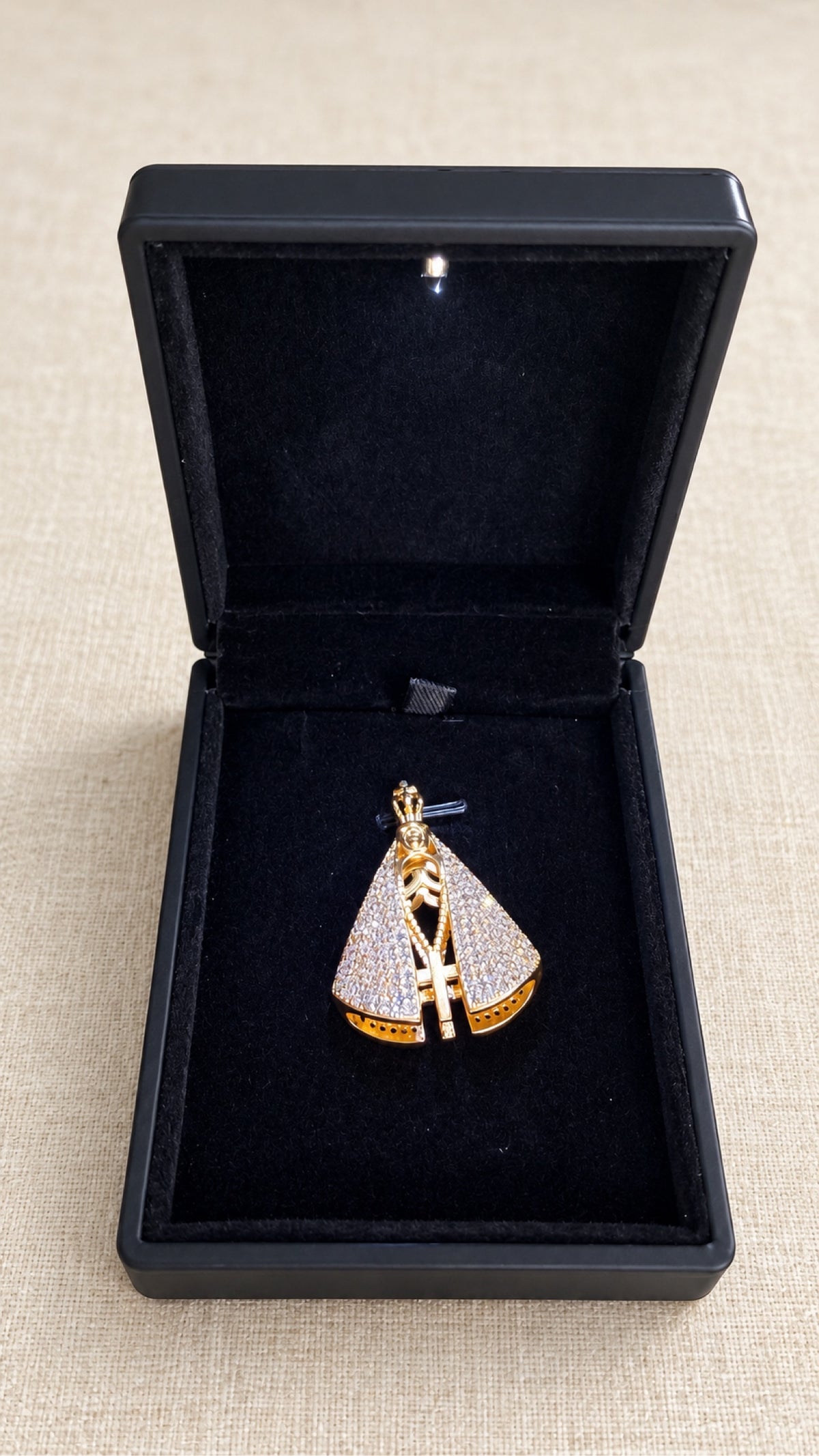 Virgin medal in black velvet gift box with light